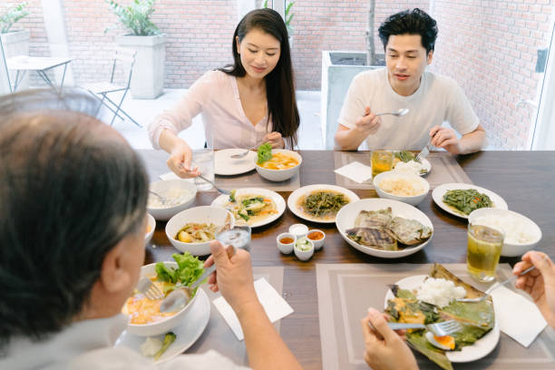 istock Multi-generation family eating in the kitchen 656861188