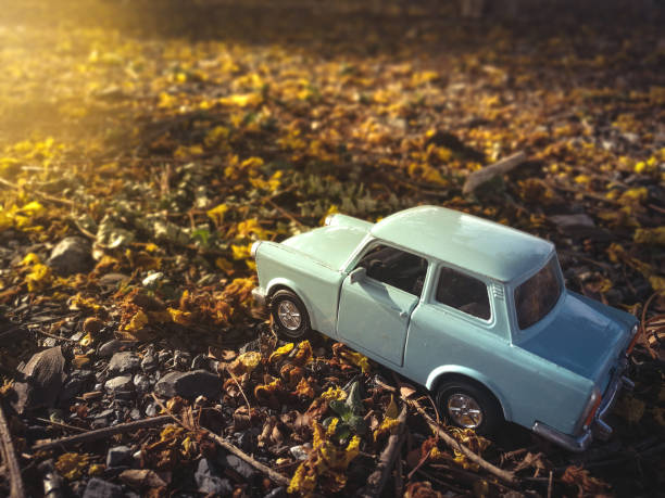 istock toy car on the road nature background ,vintage filter 656867342