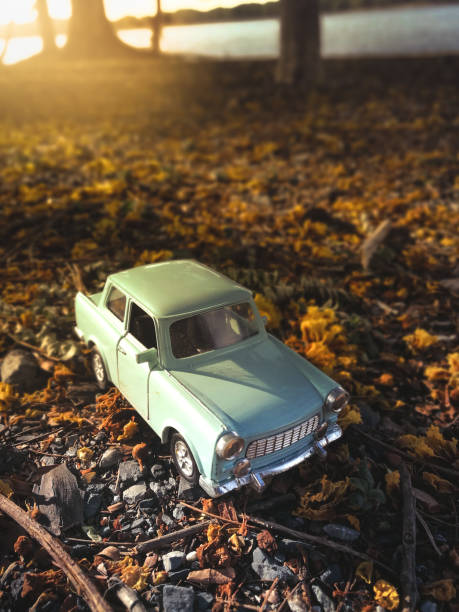 istock toy car on the road nature background ,vintage filter 656867448
