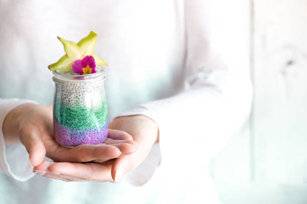 glass of colourful chia seeds pudding