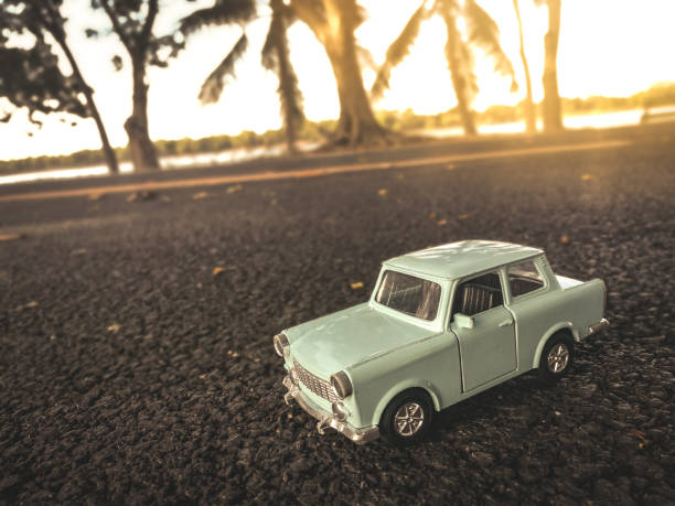 istock toy car on the road nature background ,vintage filter 656873178