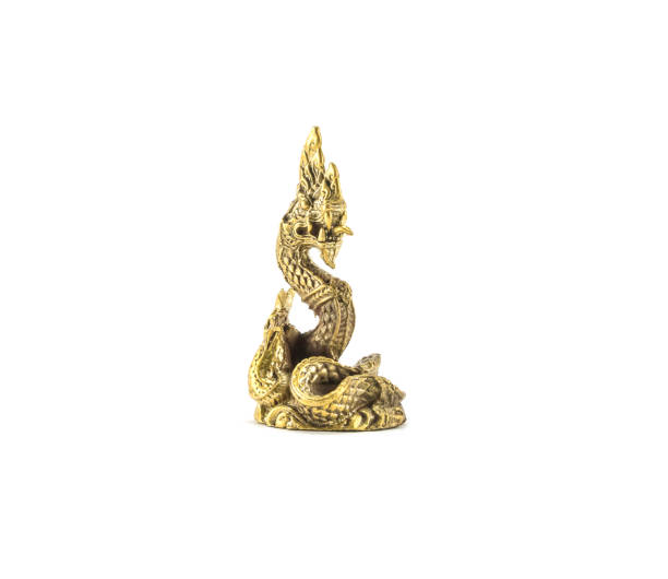 istock Closeup small brass king naga statue isolated on white background 656873274