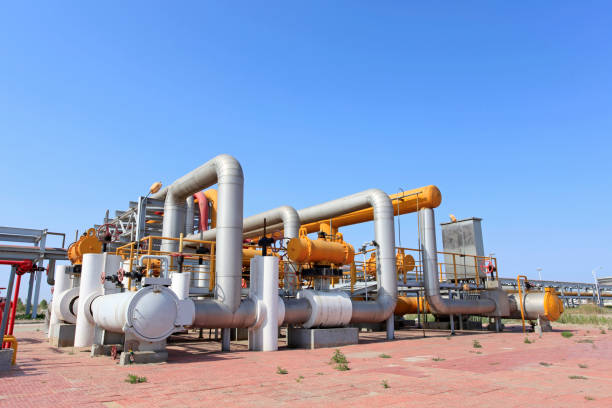 istock Oil field scene, oilfield equipment at work 656873406