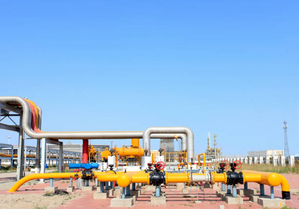 istock Oil field scene, oilfield equipment at work 656873424