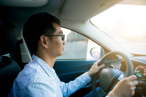 istock Businessman driving a car 656879080