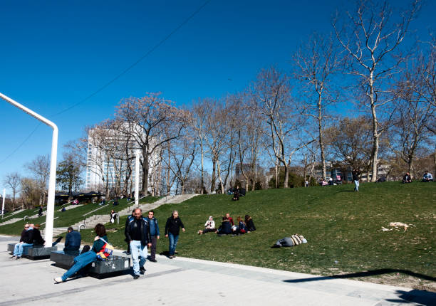 Istanbul,Turkey-March 22,2017:Taksim square in Istanbul City.The environmental regulation carried out by Istanbul Metropolitan Municipality has been going on since May 2016. The area of 100 thousand square meters is renewed. Paving stone is laid on the floor which is covered with long concrete. The side sections of the Gezi Park are joined by pedestrian access through the Talimhane entrance of Taksim Square.