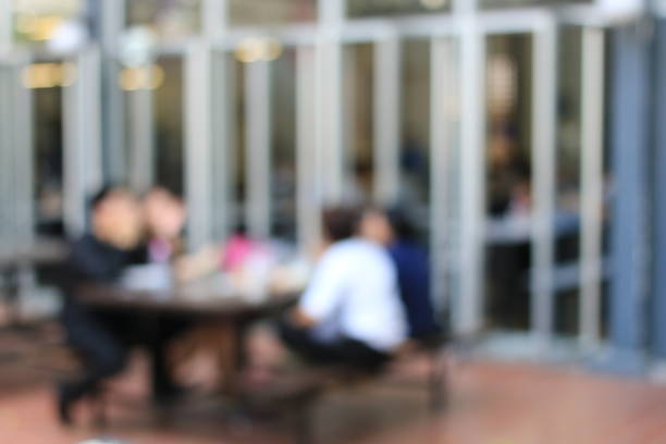 istock Blurred image people eating outside in the street. 656886036