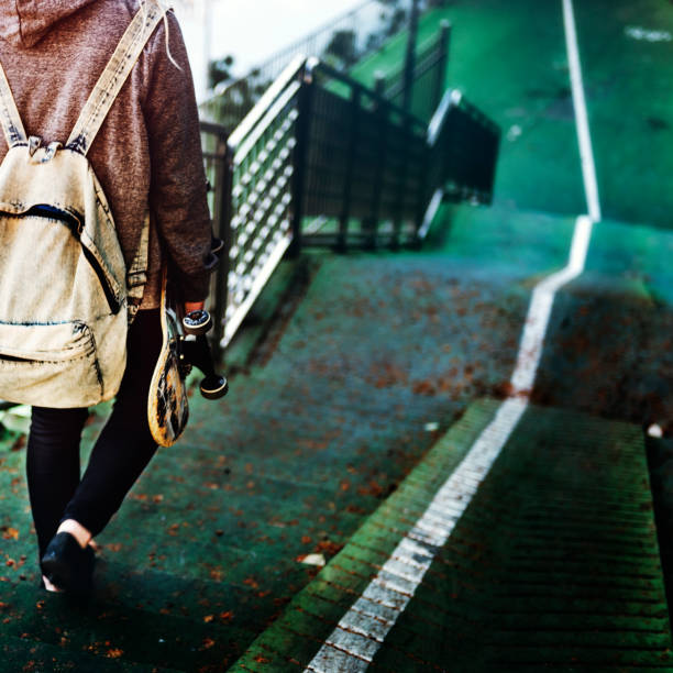 istock Young Woman Skater Walking Active Concept 656888536