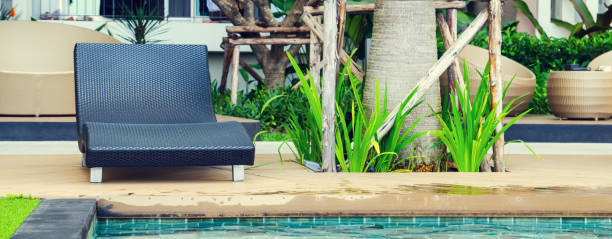 istock Relaxation with Rattan chair side swimming pool 656888600