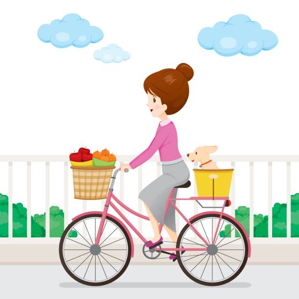 果物�と犬と自転車に乗る若い女性 - relaxation exercise fruit bicycle mode of transport点のイラスト素材／クリップアート素材／マンガ素材／アイコン素材