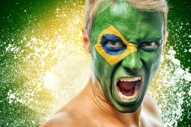 istock man with brazil flag painted on face 656899744