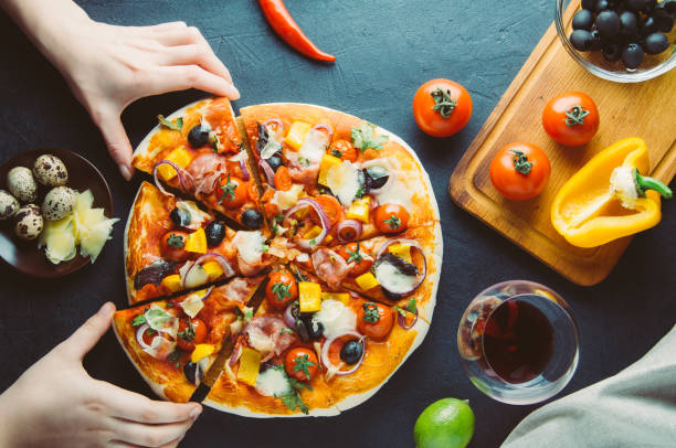 istock Homemade pizza on a dark background 656908814