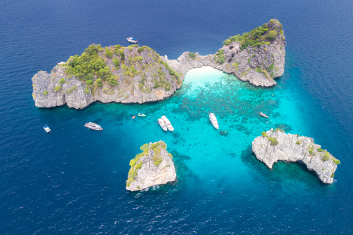Aerial of the beautiful islands of Koh Ha right of the shore of Ko Lanta in the Andaman Sea, South Thailand