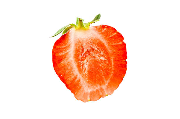 istock One half of strawberry isolated on a white background 656915736