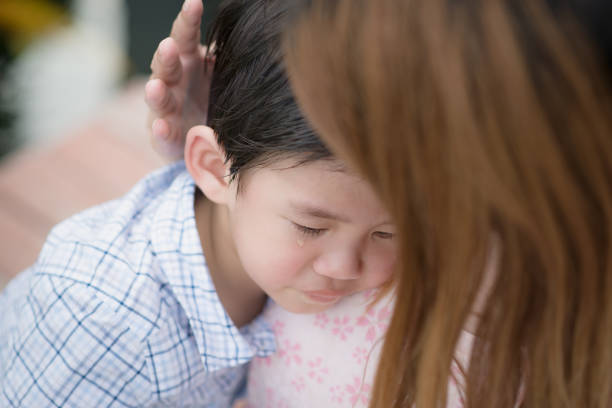 istock Mother embracing and consoling her son 656915800