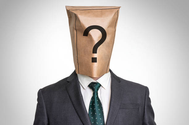 istock Businessman with a bag on the head - with question mark 656915882