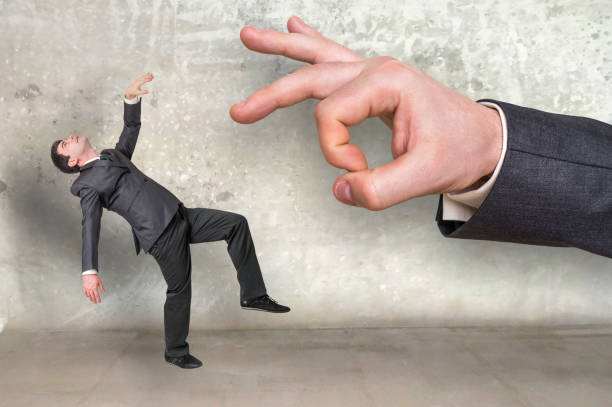 istock Falling small businessman and big businessman 656916292
