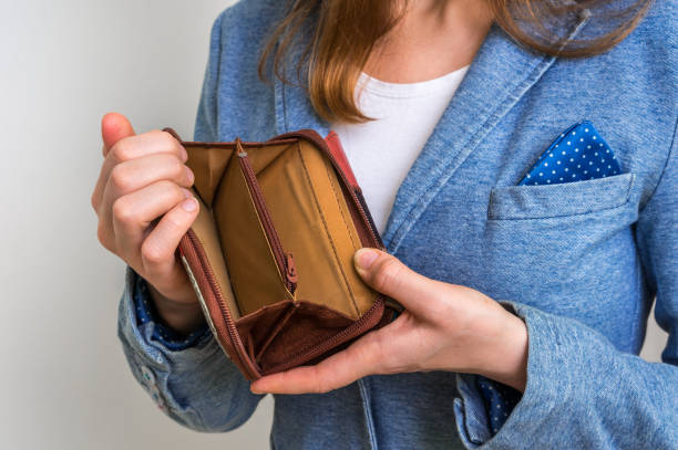 istock Woman holding an empty wallet, she hasn't money 656919656