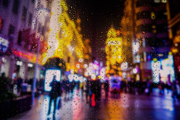 istock Rainy window with a blured city background 656919684