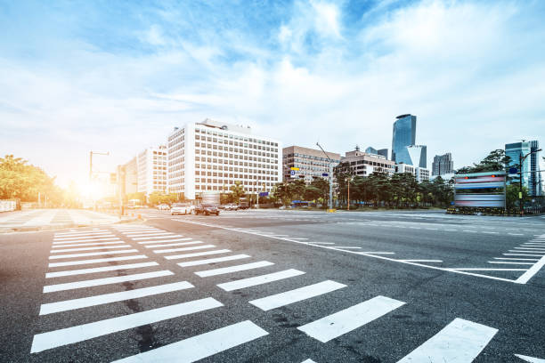 istock modern office buildings in seoul in cloud sky from road 656926756