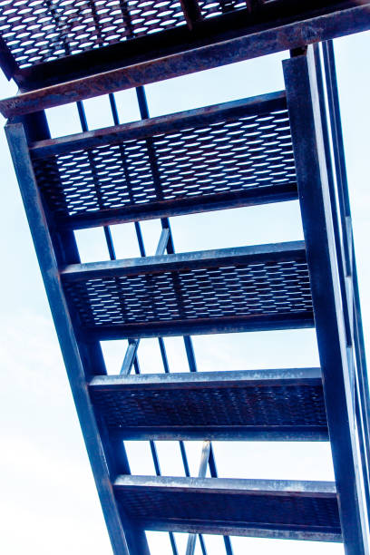 istock Silhouette black metal stairs against the sky. 656929146