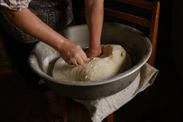 istock Making dough by female hands at home 656933926