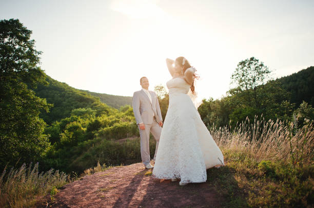 istock Just married wedding couple on sunset 656936992