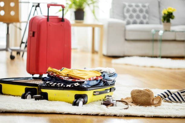 istock Preparation travel suitcase at home 656937264