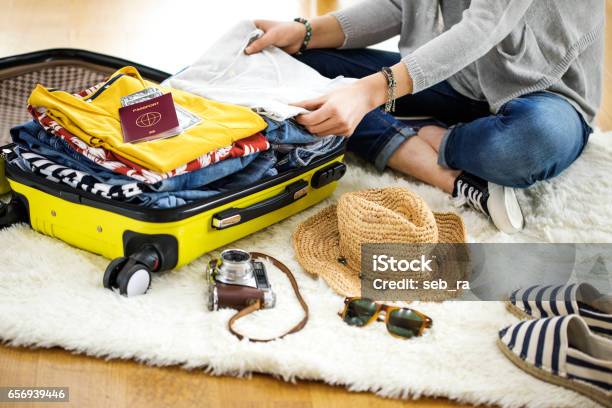 Preparation Travel Suitcase At Home Stock Photo - Download Image Now - Suitcase, Travel, Packing