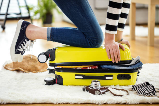 istock Preparation travel suitcase at home 656939474