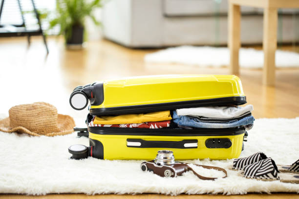 istock Preparation travel suitcase at home 656939642