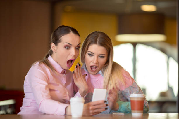 istock Female friends chatting over coffee in cafe. 656947578