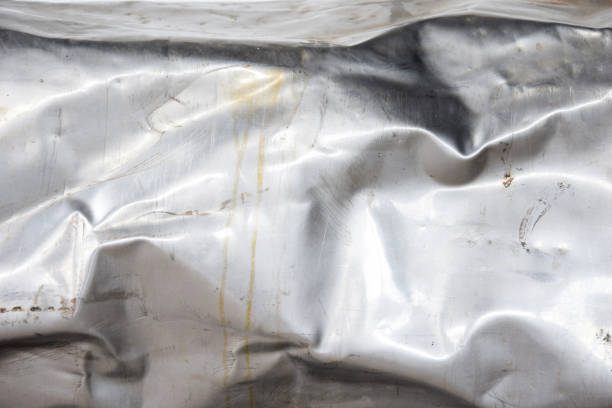 istock crumpled and scratched metal texture 656954714