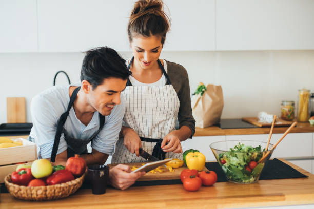 istock Young couple cooking in the kitchen 656957512