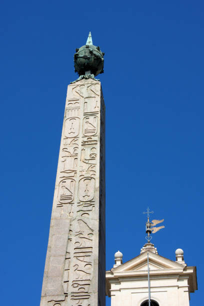 istock Palazzo Montecitorio and high old monument 656965712