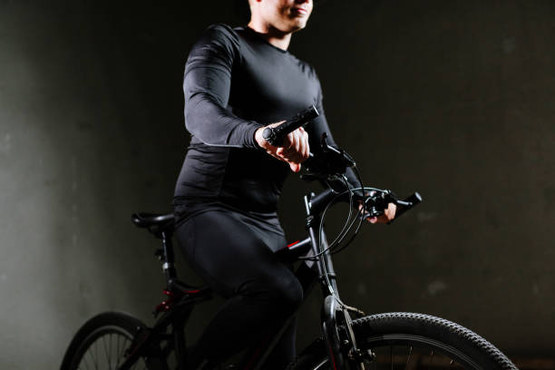istock cycle man with bike indoors 656969012