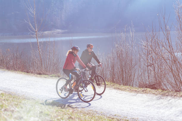 istock Active couple biking on scenic road. 656971598