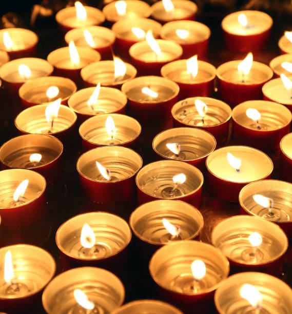 istock candles lit with the flame during the religious ceremony 656976660