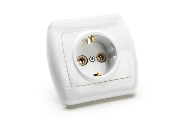 istock Closeup of electrical outlet isolated on white 656983980