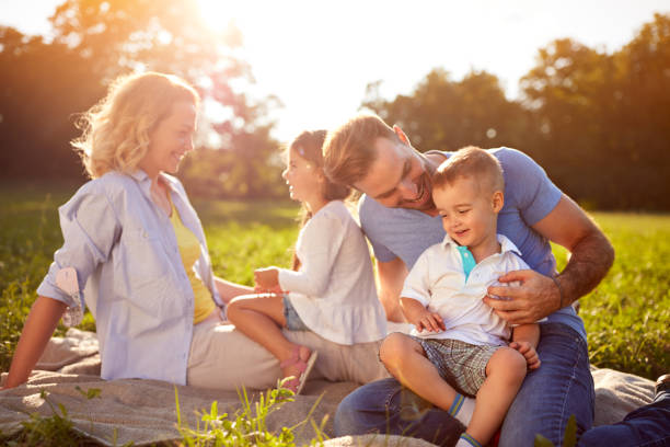 istock Children with parents in nature 656984238