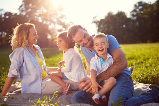 istock Family with children having fun in nature 656986898