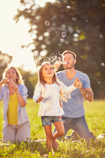 istock Fun for female child with soap bubbles 656987436