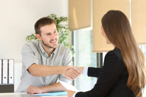 istock Employee and boss handshaking after a job interview 656989860