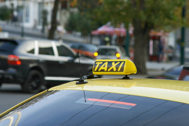 istock Yellow cab with taxi sign on roof 656992536