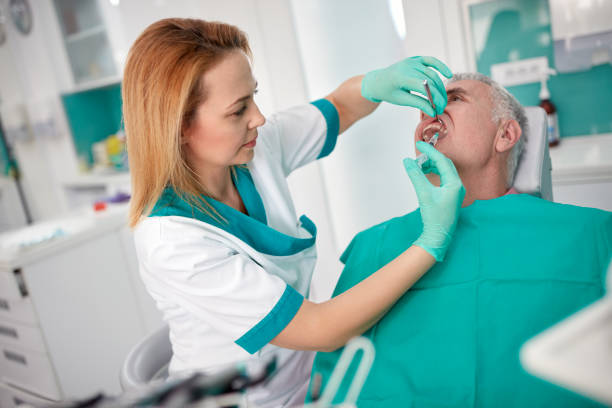 istock Senior male patient receiving anesthesia with syringe 656998896