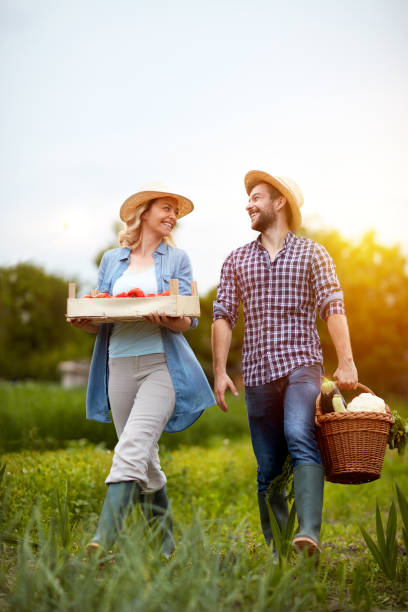istock Satisfied couple returning from business in garden 657003136