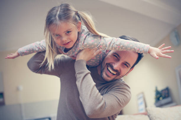 istock Young dad with cute daughter at home. 657003144