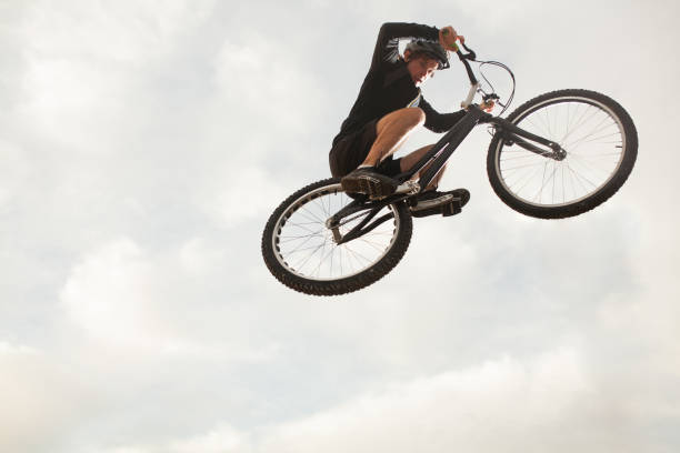 istock Person jumping on trial bike 657003794
