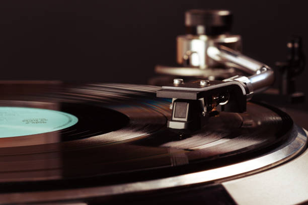 istock vintage turntable in action closeup 657007124