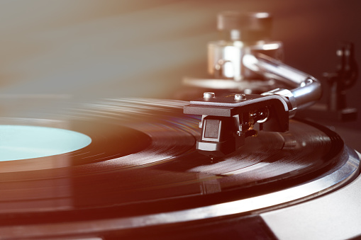 vintage turntable in action close up